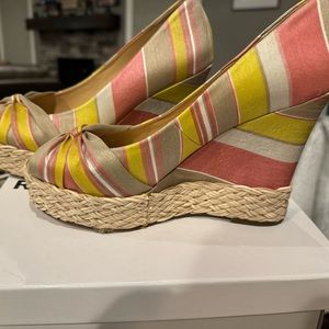 Report footwear wedge shoes.